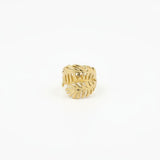 Bague ajustable Ipsē modèle Ambera en acier inoxydable doré avec un motif de deux feuilles exotiques.