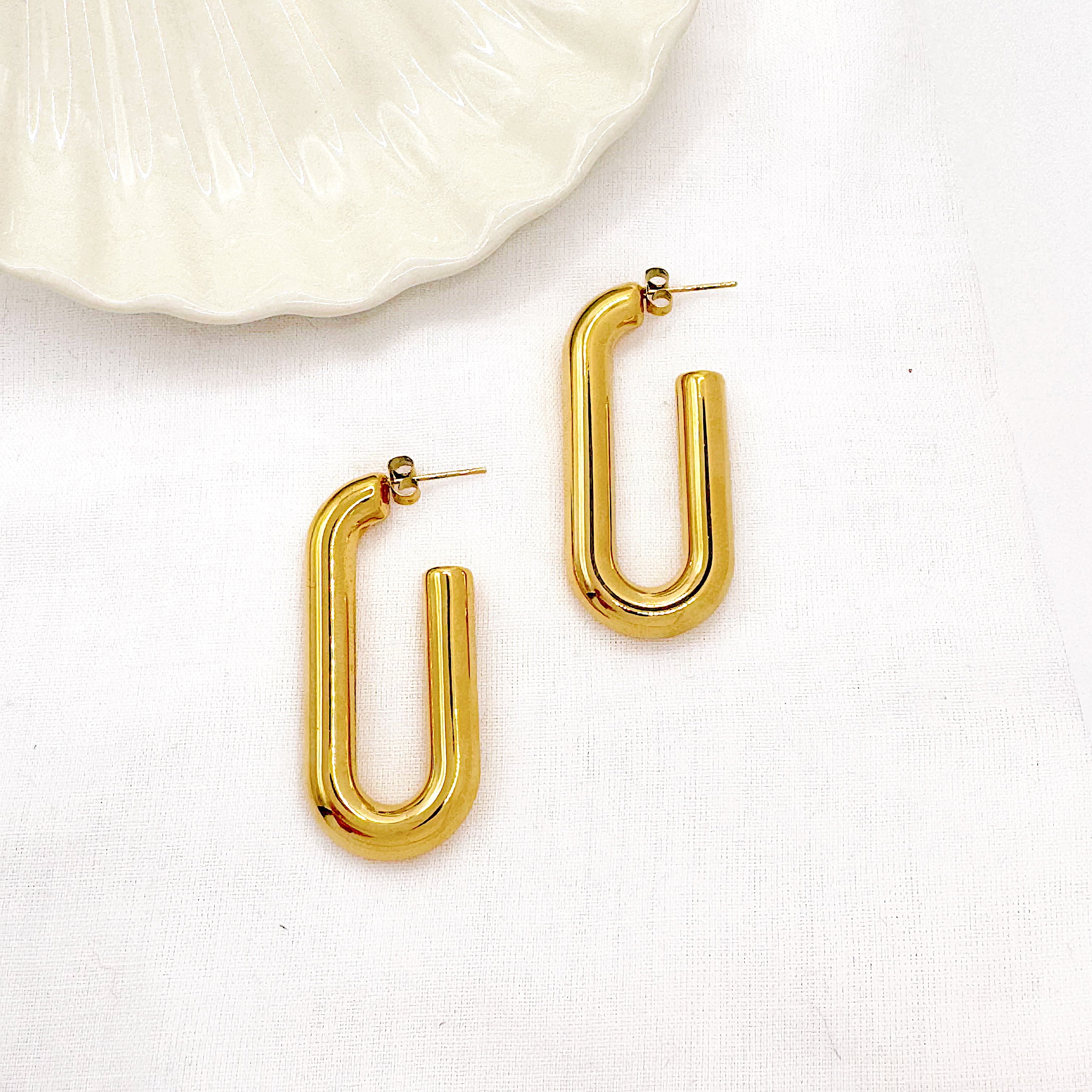 Boucles Fico, créole ovale légère en acier inoxydable doré