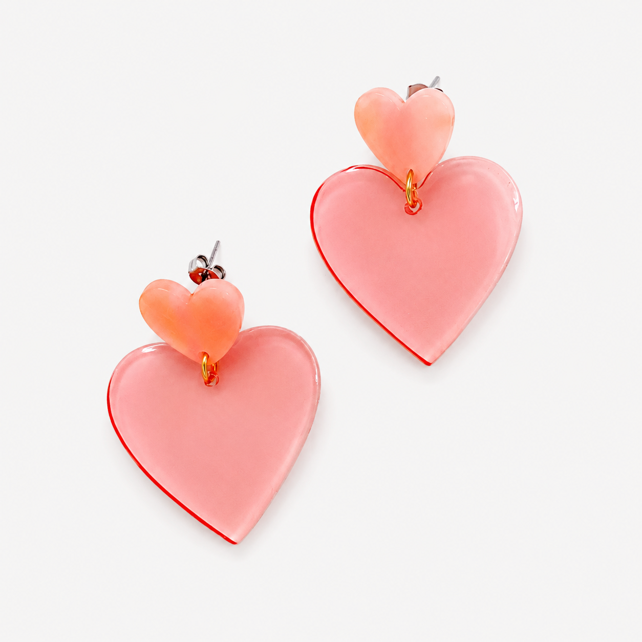 Boucles Storm, petit cœur et grand cœur en deux tons de rose, résine