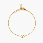 Bracelet Tessora, petit cœur asymétrique en acier inoxydable doré