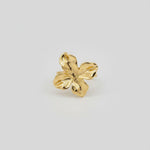 Bague ajustable Ipsē en acier inoxydable doré avec un motif de fleur texturé, résistante à l'eau.