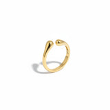 Bague fine ajustable Ipsē en acier inoxydable doré avec un design minimaliste aux extrémités arrondies.