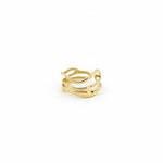 Bague Ipsē Solea ajustable en acier inoxydable doré composée de trois anneaux fins aux formes ondulées