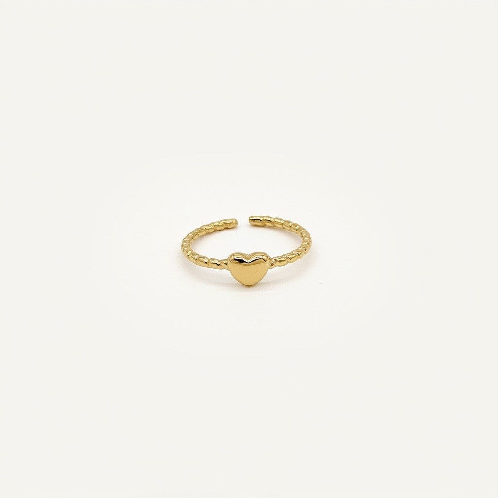 Bague fine Ipsē dorée en acier inoxydable avec anneau torsadé et motif petit cœur ajustable