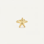 Bague Ipsē Whisper ajustable en acier inoxydable doré avec un motif étoile de mer, résistante à l'eau.