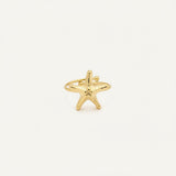 Bague Ipsē Whisper ajustable en acier inoxydable doré avec un motif étoile de mer, résistante à l'eau.